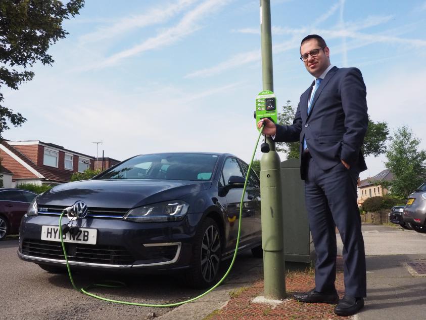 Councillor Dean Cohen, Chair of the Environment Committee, tests out one of our new charging points