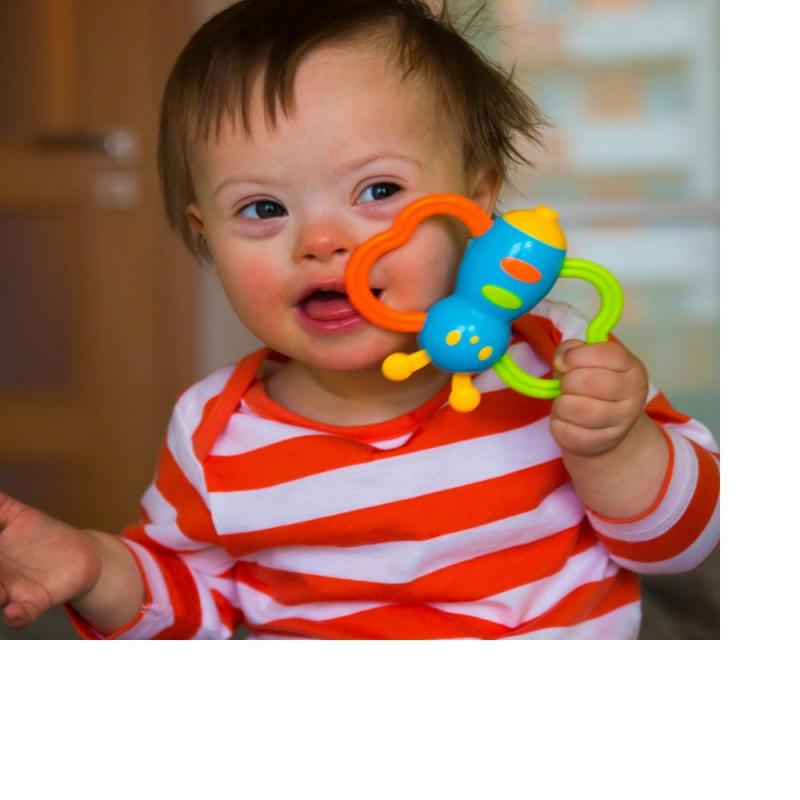 Baby smiling with toy