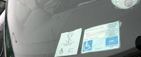 Car displaying blue badge on dashboard