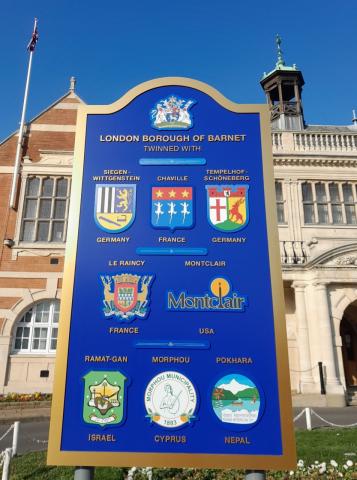 An image of the Twin Towns board that is outside of Hendon Town Hall