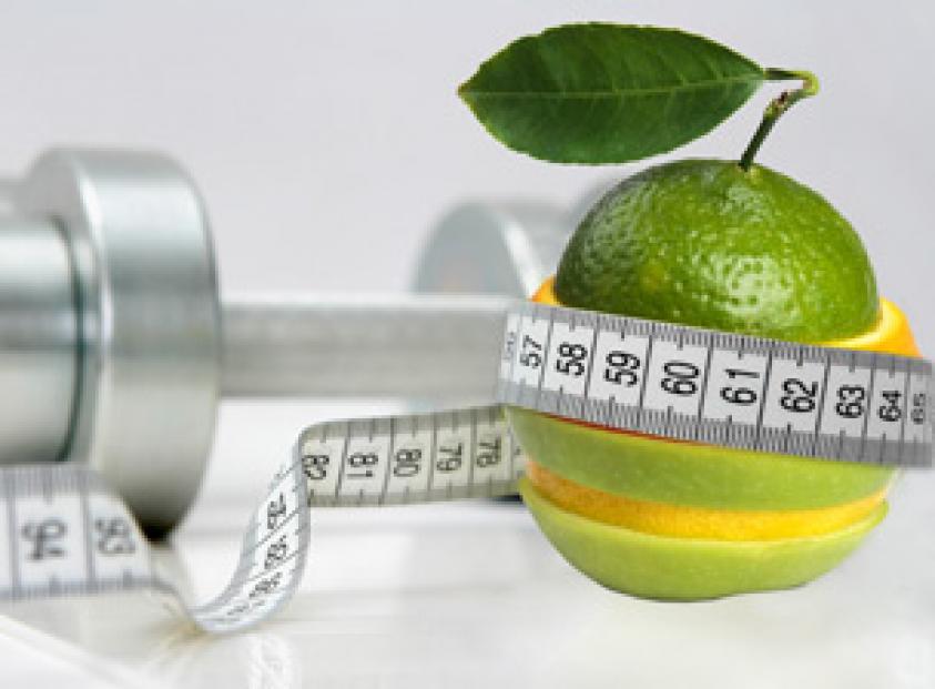 image of healthy fruit, tape measure and dumb-bell