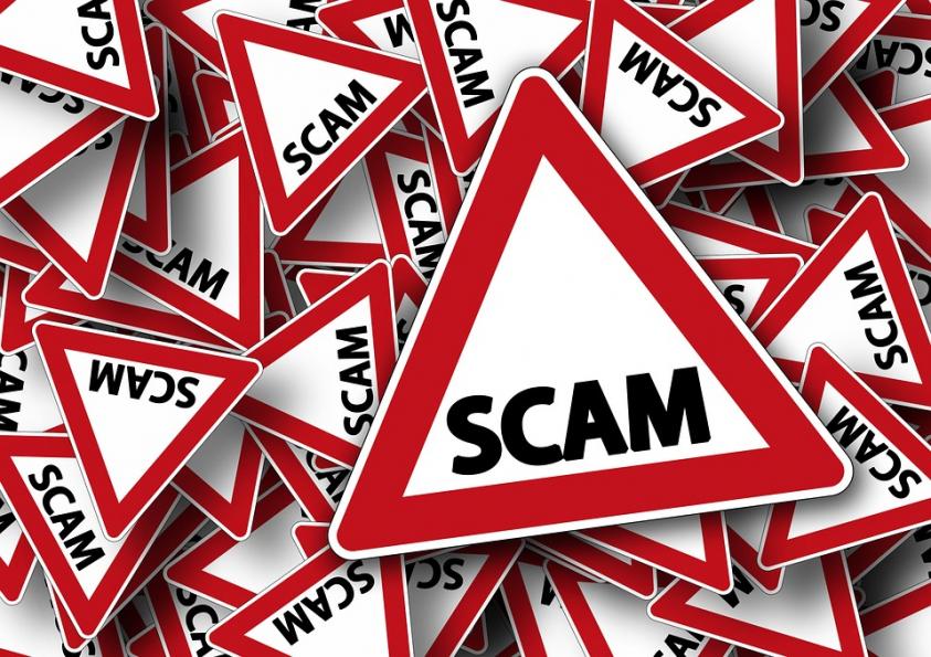 Image of scam warning signs