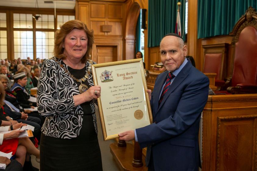 Councillor Cohen receiving his award for 40 years of service