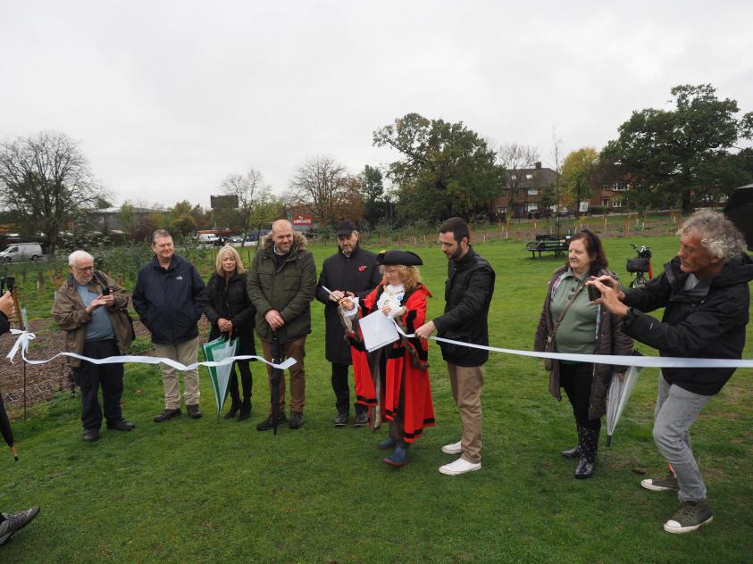 The Worshipful Mayor of Barnet, Councillor Alison Moore, joins Mill Hill Councillors Laithe Jajeh and Elliot Simberg, council officers and local residents to open the Barnet Memorial Woodland